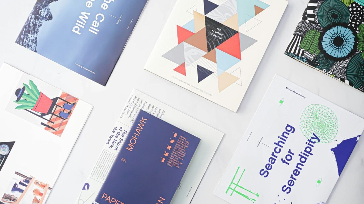 Collection of design books and magazines, showcasing branding and identity design.